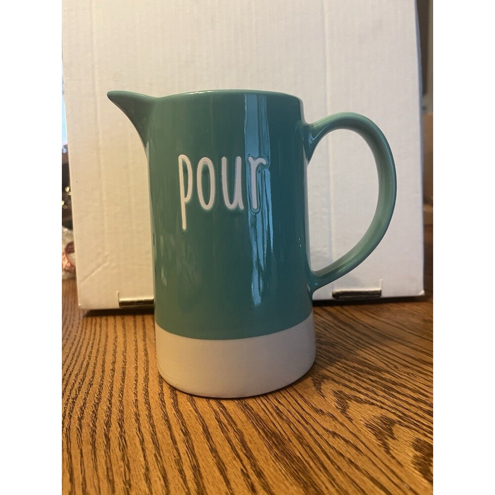 This Pitcher That Says POUR is Great For OJ or Pancake Batter